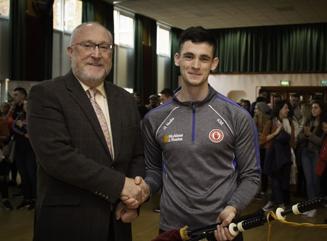 Professor Peter Finn with piper Kevin Muldoon