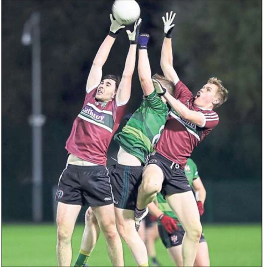 Queen's and St Mary's players during the Higher Education senior football league game