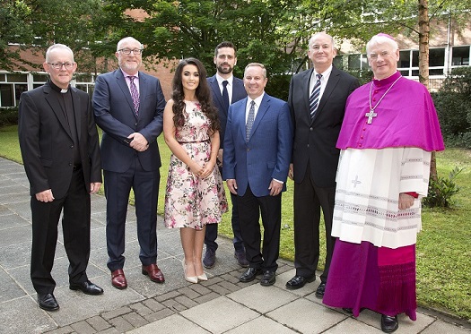 Bishop Noel Treanor, pictured with the president and vice president of St Anselm College, Students representatives of winning sports teams, the College Principal, Professor Peter Finn and the Rev Dr Paul Fleming the Head of Religious Education