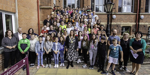 Pictured with Councillor Deirdre Hargey, Lord Mayor of Belfast are local teachers who delievered the programme, students who attended and also support staff and students from St Mary's involved in the week long Summer Transition School.