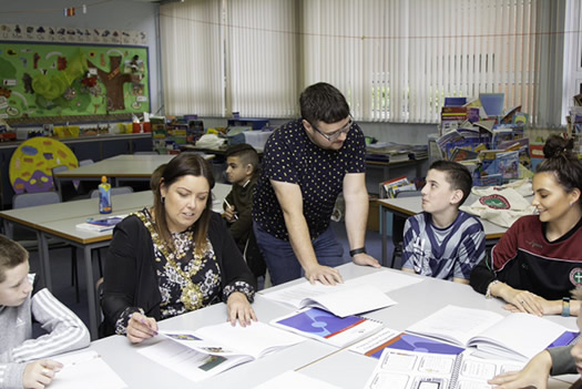 Councillor Deirdre Hargey, Lord Mayor of Belfast sitting in on one of the classes during the WBPB Summer Transition School