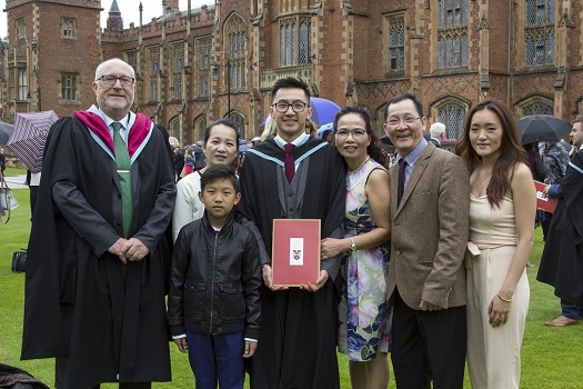  Simon Lam, is pictured with his family and the College Principal