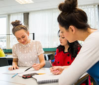 Students working at a table together